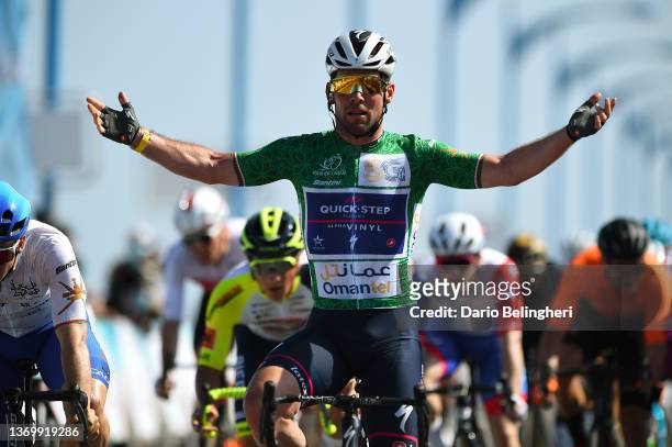 Mark Cavendish of United Kingdom and Team Quick-Step - Alpha Vinyl Green Points Jersey celebrates at finish line as stage winner during the 11th Tour...
