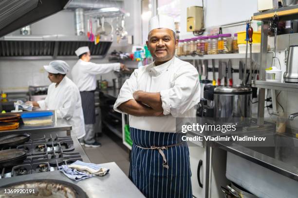 chef looking at the camera - chef's whites stock pictures, royalty-free photos & images