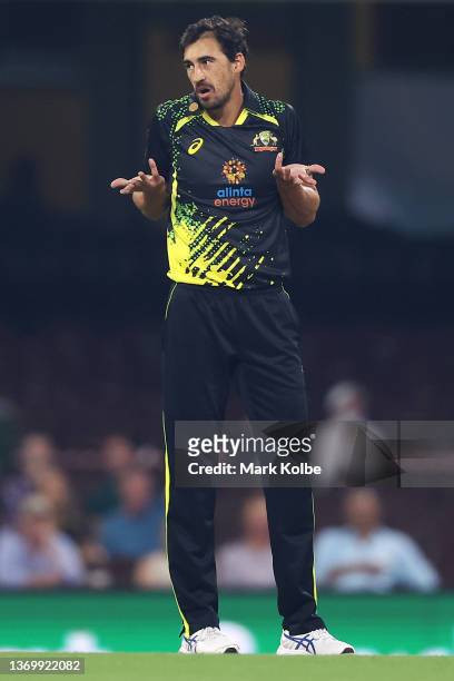 Mitchell Starc of Australia gestures to his team mates during game one in the T20 International series between Australia and Sri Lanka at Sydney...
