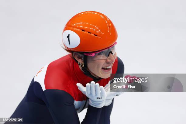 Suzanne Schulting of Team Netherlands celebrates after setting a new World Record time of 1:26.514 during the Women's 1000m Quarterfinals on day...