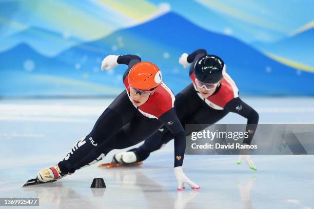 Suzanne Schulting of Team Netherlands skates on the way to setting a new World Record time of 1:26.514 ahead of Xandra Velzeboer of Team Netherlands...