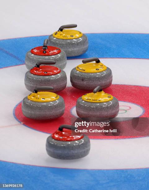 View of the curling stones during the Women's Round Robin Curling Session on Day 7 of the Beijing 2022 Winter Olympic Games at National Aquatics...