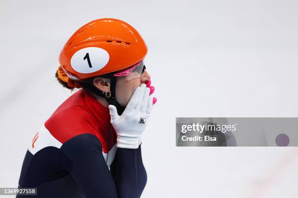 Suzanne Schulting of Team Netherlands celebrates after setting a new World Record time of 1:26.514 during the Women's 1000m Quarterfinals on day...