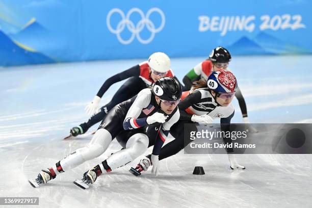 Kristen Santos of Team United States and Minjeong Choi of Team South Korea compete during the Women's 1000m Quarterfinals on day seven of the Beijing...