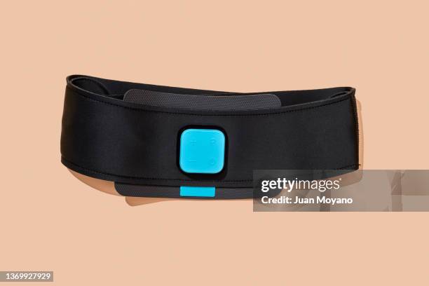 black electrical muscle stimulation waistband - waistband stock pictures, royalty-free photos & images