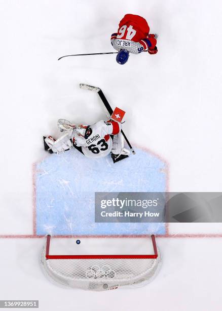 David Krejci of Team Czech Republic scores the game winning goal in penalty shoot out over Leonardo Genoni, goaltender of Team Switzerland during the...