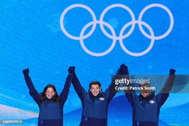 Gold medallists, Ashley Caldwell, Christopher Lillis and Justin Schoenefeld of Team United States celebrate during the Freestyle Skiing Mixed Team...