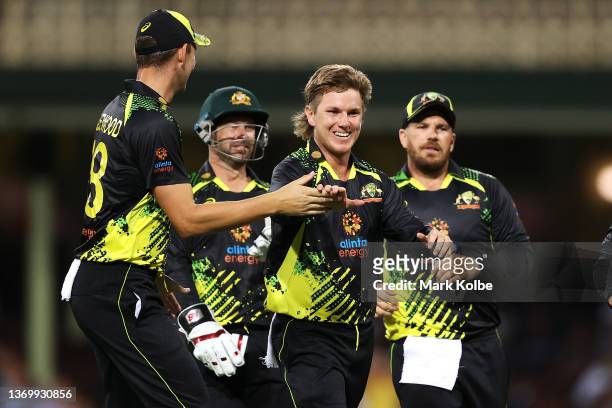 Adam Zampa of Australia celebrates taking the wicket of Charith Asalanka of Sri Lanka during game one in the T20 International series between...