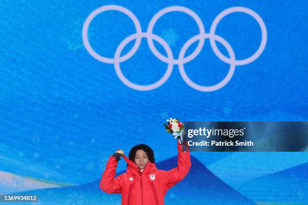 Gold medallist, Ayumu Hirano of Team Japan poses with their medal during the Men's Snowboard Halfpipe medal ceremony on Day 7 of the Beijing 2022...