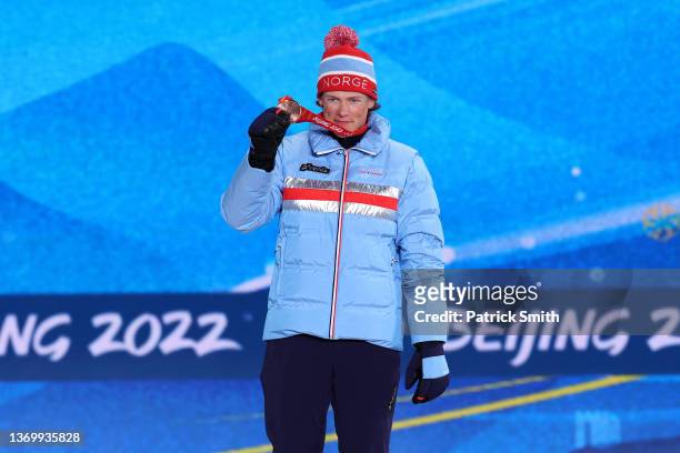 Bronze medallist, Johannes Hoesflot Klaebo of Team Norway poses with their medal during the Men's Cross-Country Skiing 15km Classic medal ceremony on...