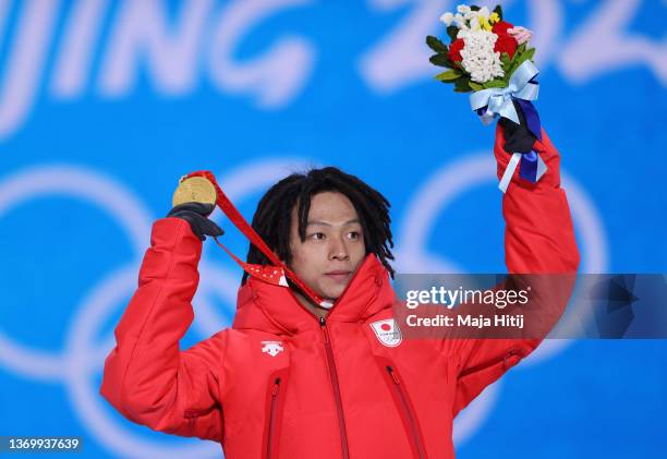 Gold medallist, Ayumu Hirano of Team Japan poses with their medal during the Men's Snowboard Halfpipe medal ceremony on Day 7 of the Beijing 2022...