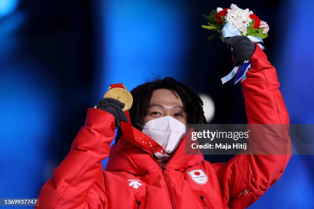 Gold medallist, Ayumu Hirano of Team Japan poses with their medal during the Men's Snowboard Halfpipe medal ceremony on Day 7 of the Beijing 2022...