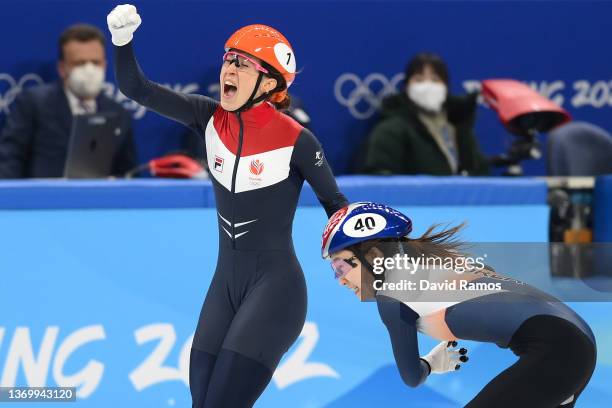 Suzanne Schulting of Team Netherlands celebrates winning the Gold medal ahead of Minjeong Choi of Team South Korea during the Women's 1000m Final A...