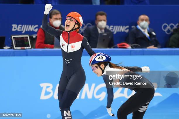 Suzanne Schulting of Team Netherlands celebrates winning the Gold medal ahead of Minjeong Choi of Team South Korea during the Women's 1000m Final A...