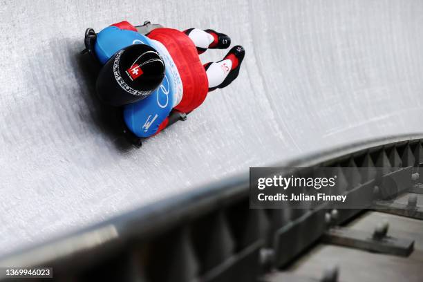 Basil Sieber of Team Switzerland slides during the Men's Skeleton Heat 3 on day seven of Beijing 2022 Winter Olympic Games at National Sliding Centre...