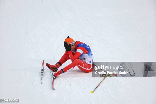Elie Tawk of Team Lebanon reacts after finishing during the Men's Cross-Country Skiing 15km Classic on Day 7 of Beijing 2022 Winter Olympics at The...