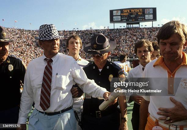 Alabama coach Bear Bryant with Tennesse coach Johnny Majors after game at Bryant-Denny Stadium. Birmingham, AL CREDIT: Heinz Kluetmeier