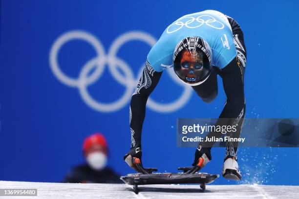 Nathan Crumpton of Team American Samoa slides during the Men's Skeleton Heat 4 on day seven of Beijing 2022 Winter Olympic Games at National Sliding...