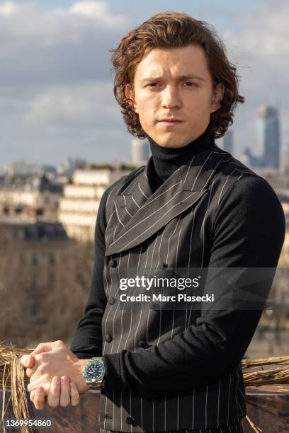 Actor Tom Holland attends the "Uncharted" photocall at cinema Publicis Champs-Elysees on February 11, 2022 in Paris, France.