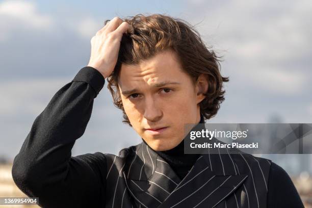 Actor Tom Holland attends the "Uncharted" photocall at cinema Publicis Champs-Elysees on February 11, 2022 in Paris, France.