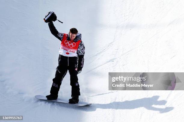 Shaun White of Team United States reacts during this third run in the Men's Snowboard Halfpipe Final on day 7 of the Beijing 2022 Winter Olympics at...