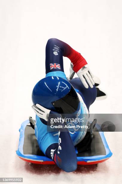 Matt Weston of Team Great Britain reacts after sliding during the Men's Skeleton Heat 4 on day seven of Beijing 2022 Winter Olympic Games at National...