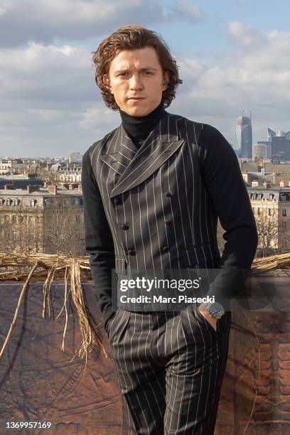 Actor Tom Holland attends the "Uncharted" photocall at cinema Publicis Champs-Elysees on February 11, 2022 in Paris, France.