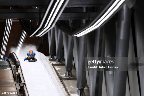 Axel Jungk of Team Germany slides during the Men's Skeleton Heat 4 on day seven of Beijing 2022 Winter Olympic Games at National Sliding Centre on...