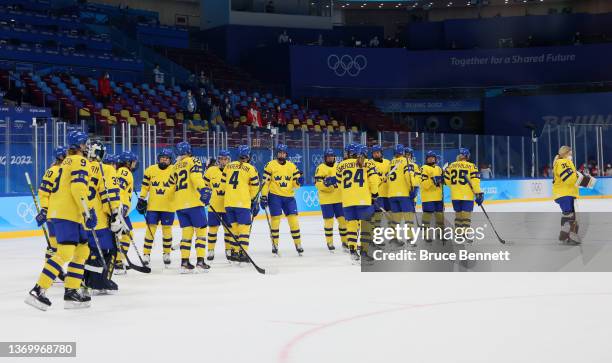 Team Sweden after their 11-0 loss to Team Canada in the third period during the Women's Ice Hockey Quarterfinal match on Day 7 of the Beijing 2022...
