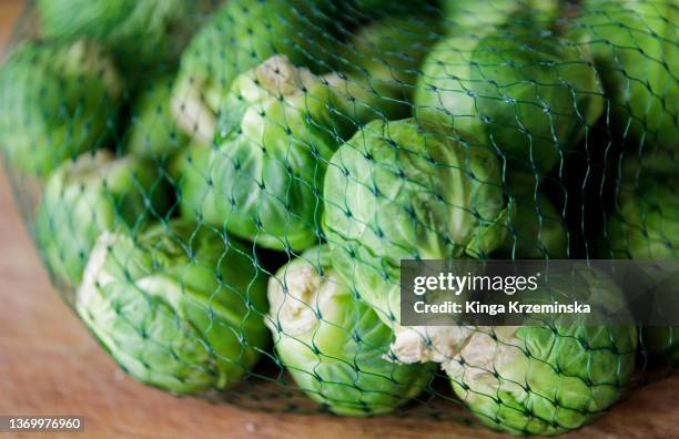 brussels sprout - small plastic bag stock pictures, royalty-free photos & images