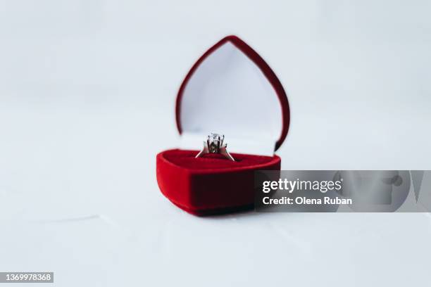 silver ring with diamond in heart shape box. - engagement stock pictures, royalty-free photos & images
