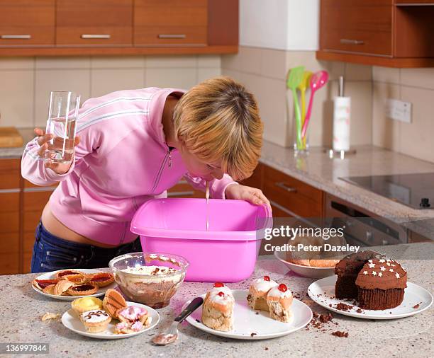 bulimic binge eating and vomiting - trifle stock pictures, royalty-free photos & images