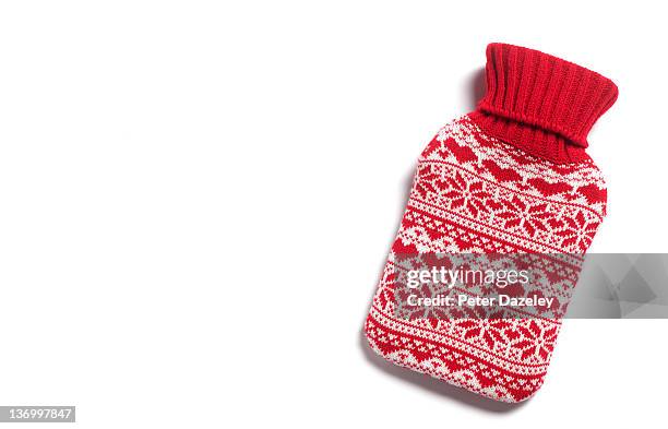 winter hot water bottle with hearts - wärmflasche stock-fotos und bilder