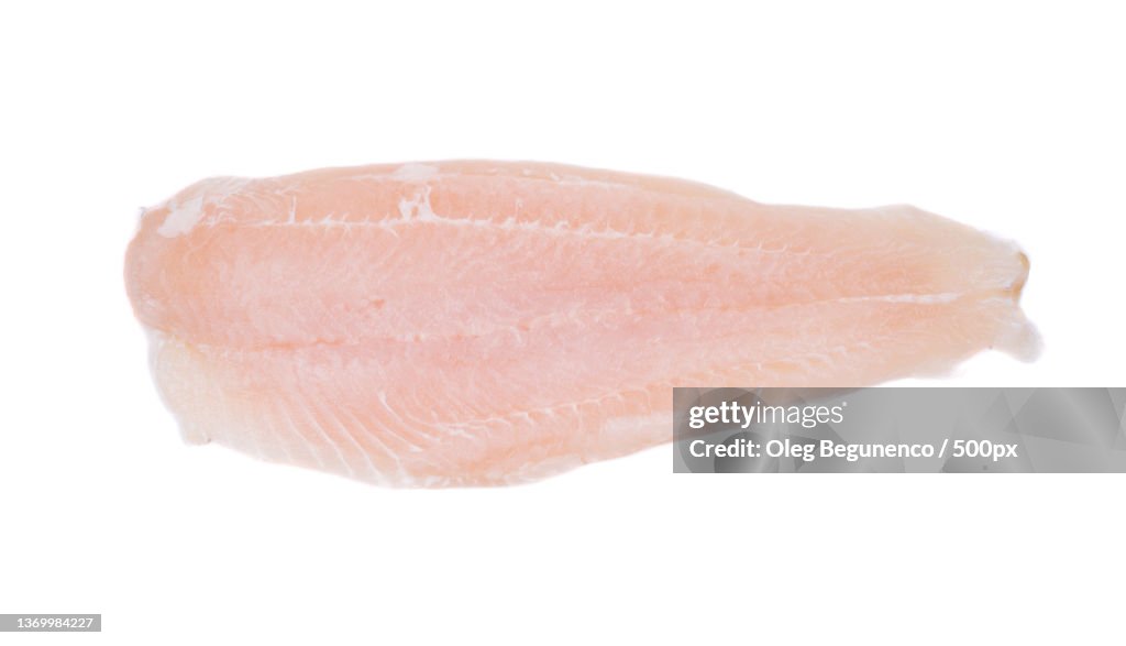 Fresh fillet of pangasius,High angle view of meat on white background,Moldova
