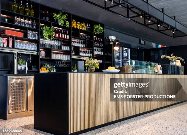modern, empty bar counter in a trendy restaurant - beverage fridge stock pictures, royalty-free photos & images