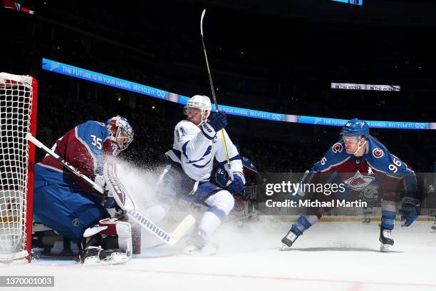 Steven Stamkos of the Tampa Bay Lightning shoots against goaltender Darcy Kuemper and Mikko Rantanen of the Colorado Avalanche at Ball Arena on...