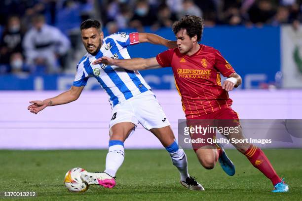 Recio of CD Leganes battle for the ball with Ivan Azon of Real Zaragoza during the LaLiga Smartbank match between CD Leganes and Real Zaragoza at...