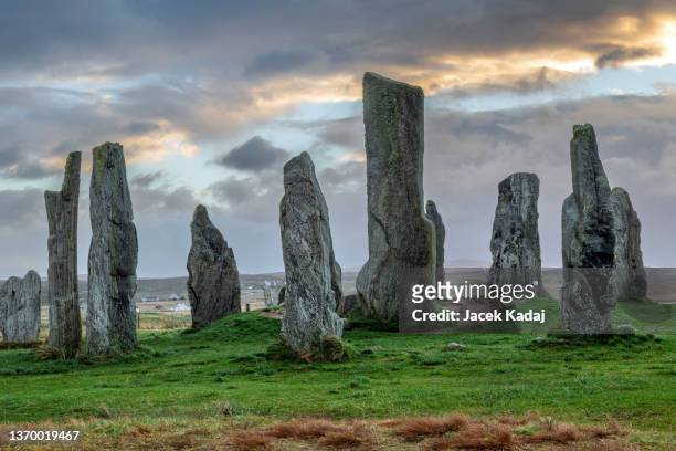 calanais standing stones on the isle of lewis in scotland, united kingdom - stone circle stock pictures, royalty-free photos & images