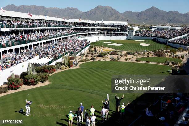 Nick Watney of the United States hits his tee shot on the 16th hole during the second round of the WM Phoenix Open at TPC Scottsdale on February 11,...