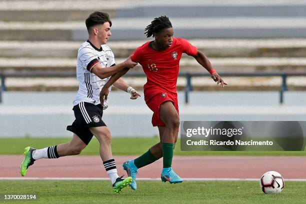 Samuel Di Benedetto of u17 Germany challenges Ivan Lima of u17 Portugal during the Algarve Cup U17 match between U17 Portugal vs U17 Germany at...