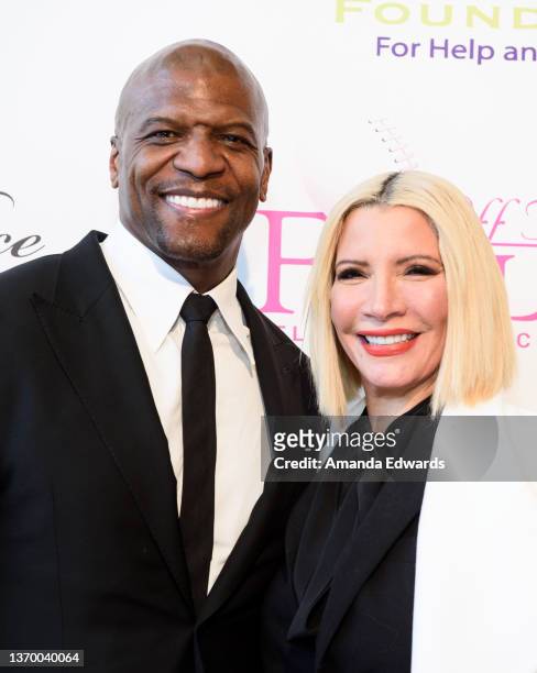 Terry Crews and Rebecca King-Crews attend the 21st Annual NFL Players' Wives Association charity fashion show at Santa Monica Place on February 11,...