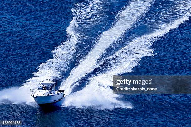 fast motorboat - wake boat stock pictures, royalty-free photos & images