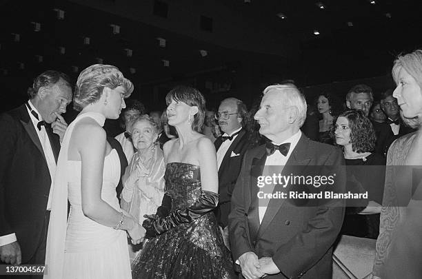 Diana, Princess of Wales meets American actress Lillian Gish and director Lindsay Anderson at the Cannes Film Festival in France, May 1987. Anderson...