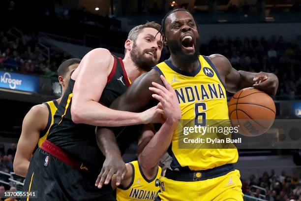 Kevin Love of the Cleveland Cavaliers and Lance Stepenson of the Indiana Pacers battle for a loose ball in the fourth quarter at Gainbridge...
