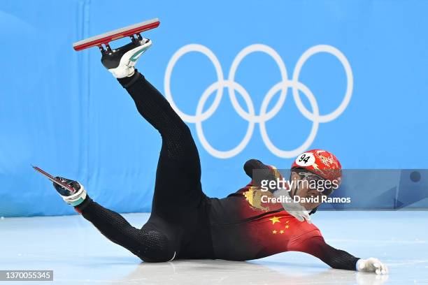 Wenlong Li of Team China crashes during the Men's 5000m Relay Semifinals on day seven of the Beijing 2022 Winter Olympic Games at Capital Indoor...
