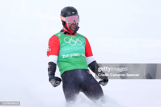 Nick Baumgartner of Team United States reacts during the Snowboard Mixed Team Cross Big Final on Day 8 of the Beijing 2022 Winter Olympics at Genting...