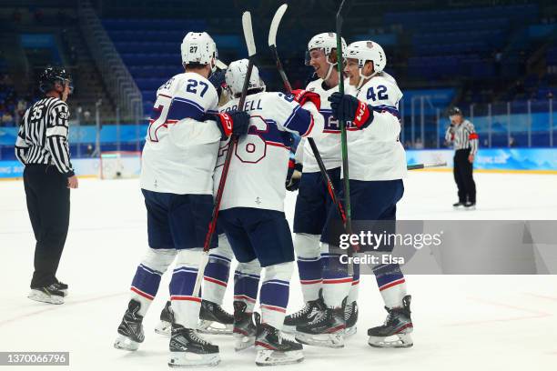 Ben Meyers of Team United States celebrates with Noah Cates, Sean Farrell, Aaron Ness of Team United States and another teammate after Meyers scored...