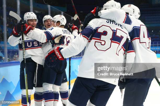 Brendan Brisson of Team United States celebrates with Nick Perbix, Nathan Smith, Nick Shore and Aaron Ness after scoring a goal in the second period...