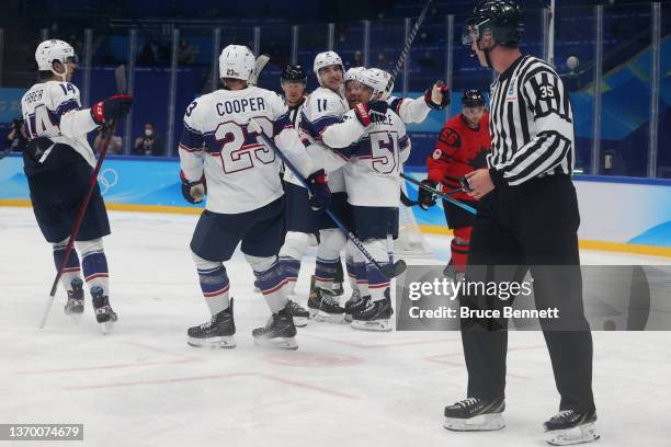 Kenny Agostino of Team United States celebrates with Brock Faber, Brian Cooper, Andy Miele and Brian Oneill of Team United States after Agostino...