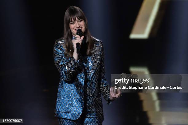 Clara Luciani reacts after receiving the Best Album award for "Coeur" during the 37th Victoires de la Musique at La Seine Musicale on February 11,...